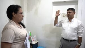 Xiomara De Los Santos Altafulla Rodriguez Notario Primero del Circulo de Santa Marta y el Dr. Alfredo Martinez Gutierrez.