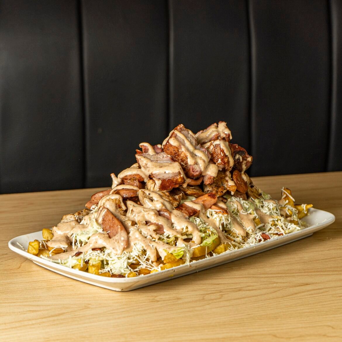 Plato que se servirá en el Festival de la Salchipapa